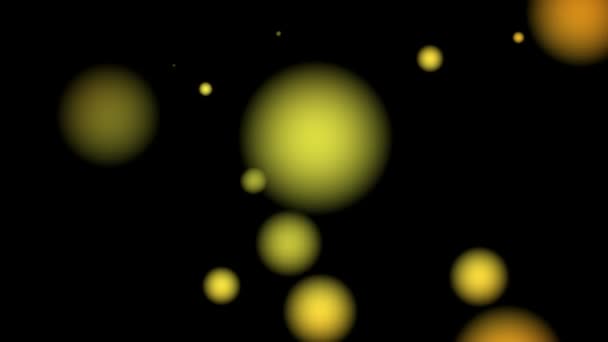 Volando borrosas esferas amarillas — Vídeo de stock