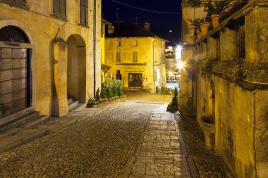 Orta San Giulio old city, night view. Color photo clipart