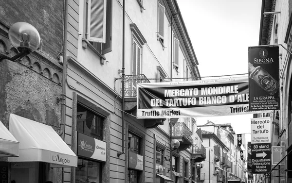 Alba (Cuneo), signs of the International Truffle Fair. Black and white photo. — Stock fotografie