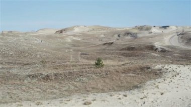 Sonsuz doğal kum tepeleri ve her yerinde bitkilerin biraz ile inanılmaz manzara Pan vurdu. Curonian Spit Baltık Denizi kıyısından Curonian Lagünü ayıran uzun ince kavisli kumul tükürük