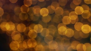 Yavaş ve sakin bir şekilde hareket sarı kahverengi bokeh ışıklar