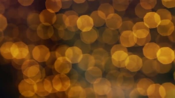 Gelb braune Bokeh-Lichter bewegen sich langsam und ruhig — Stockvideo