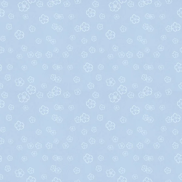 Seamless pattern of flowers on a solid background, fabric texture design