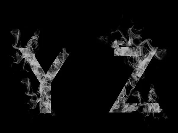 Шрифтовый дым. Буквы Y Z — стоковое фото