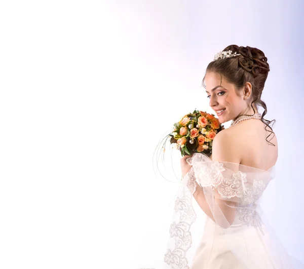 Portrait of Beautiful Bride in the Veil with a Bouquet, Looking — Stock Photo, Image