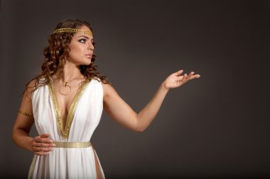 Classical Greek Goddess in Tunic Showing Something  clipart