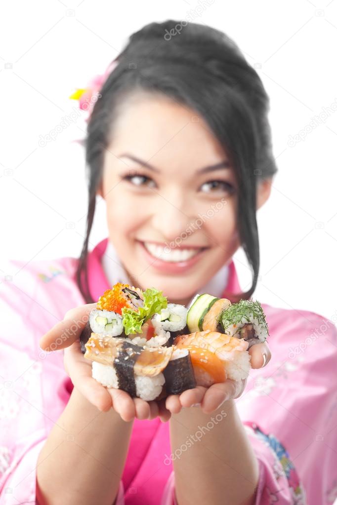 Happy Woman Eating Sushi