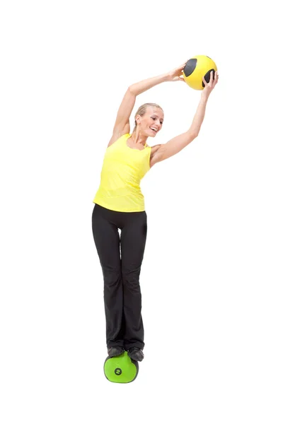 Fitness with ball: young woman doing exercises — Stock Photo, Image