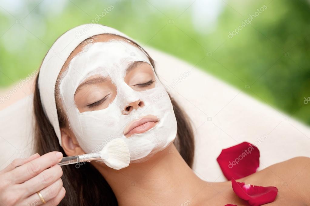 Young Natural Relaxing Beauty Having Moistening Mask Applied