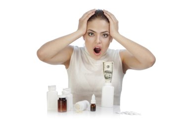 Young beautiful woman scared by medicines clipart