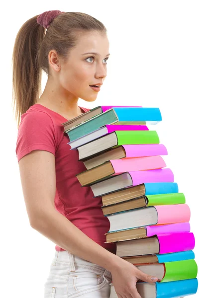 Sorpresa giovane donna in possesso di libri — Foto Stock