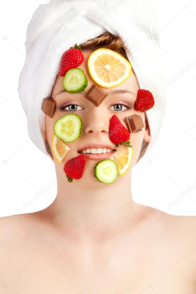 Strawberries, lemons, cucumbers and chocolate on the beautiful f