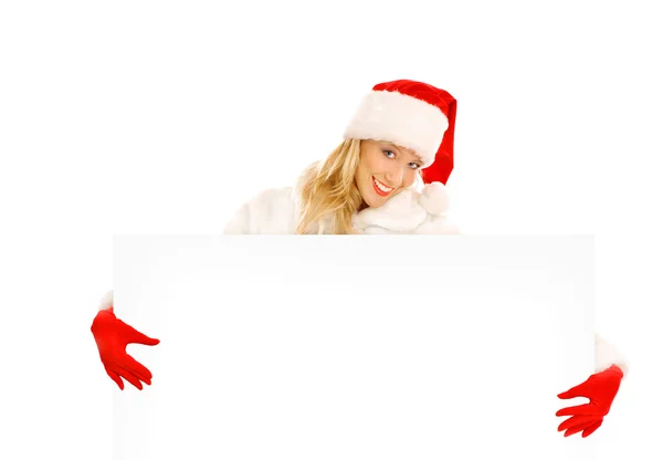 性感的女孩打扮成圣诞老人点手指到副本空间 — 图库照片