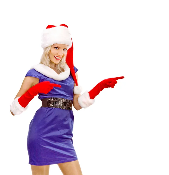 Sexy chica vestida como Santa Claus señala dedo para copiar espacios — Foto de Stock