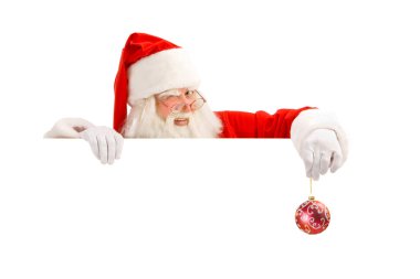 Winking Classic Santa Holding a Sign. clipart