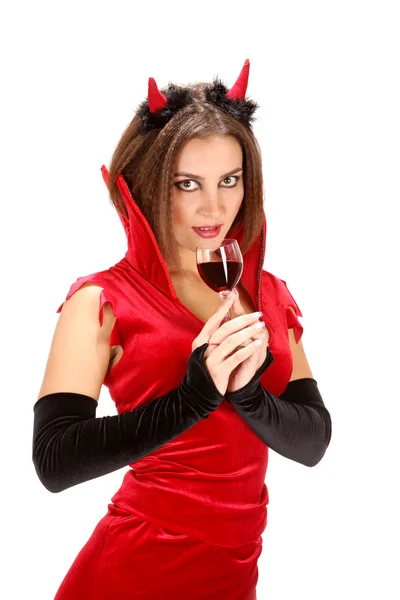 Vrouwelijke duivel met glas rode wijn — Stockfoto