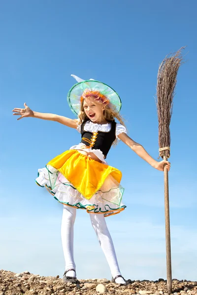 Happy Little Witch Standing with a Broom — Stock Photo, Image