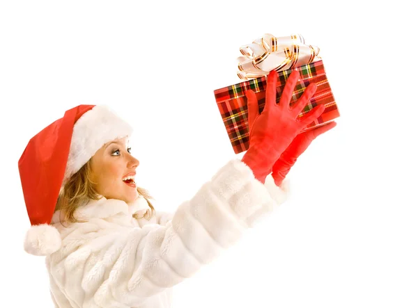 Chica atractiva en un abrigo de piel blanca y sombrero de Santa Claus con Ch — Foto de Stock