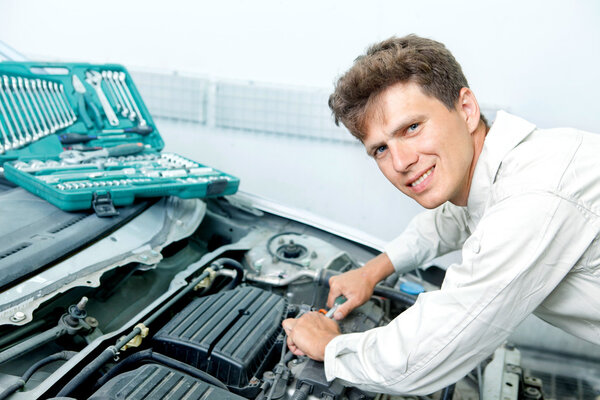 Real Mechanic Working in Auto Repair Shop