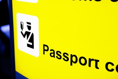 Sign Pointing to Passport Control Area clipart
