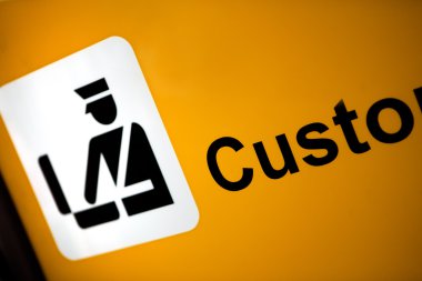 Sign Pointing to Customs Konrol Area clipart