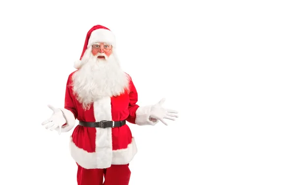 Weihnachtsmann - claus blickt durch seine Brille aufmerksam direkt auf die — Stockfoto