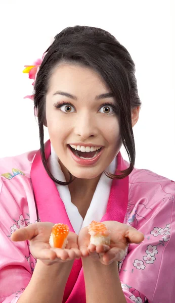 Ευτυχισμένη γυναίκα μυρίζοντας σούσι σχετικά με τα χέρια της — Φωτογραφία Αρχείου