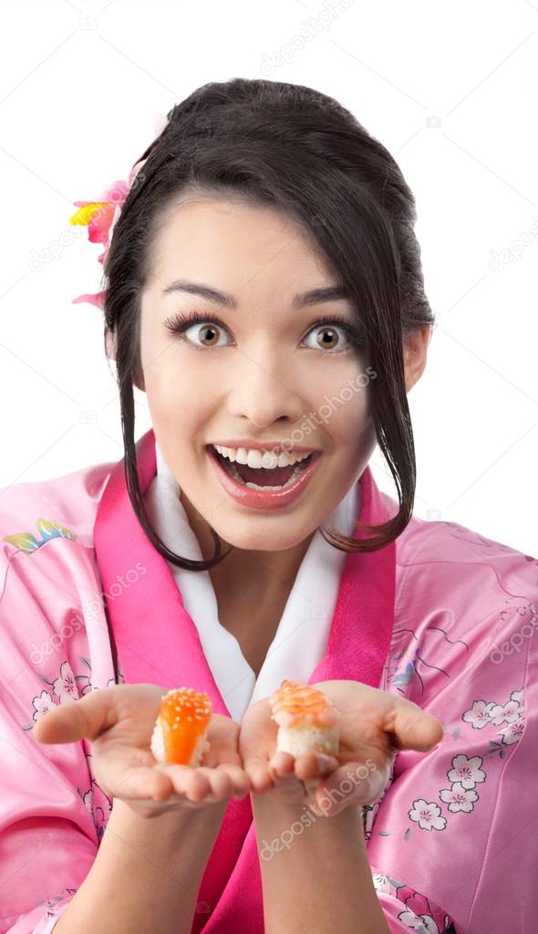 Happy Woman Smelling Sushi on her Hands