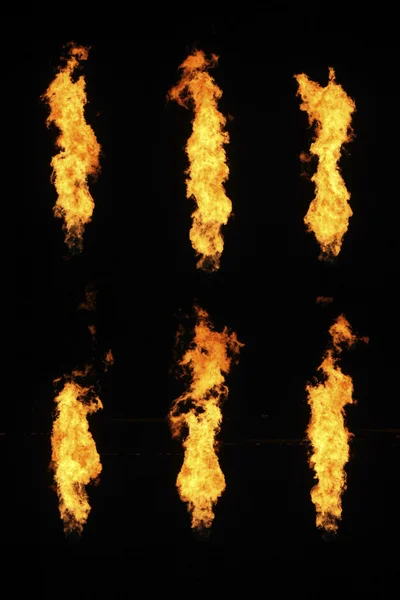 Six (6) Pillars of Fire on a Black Background — Stock Photo, Image