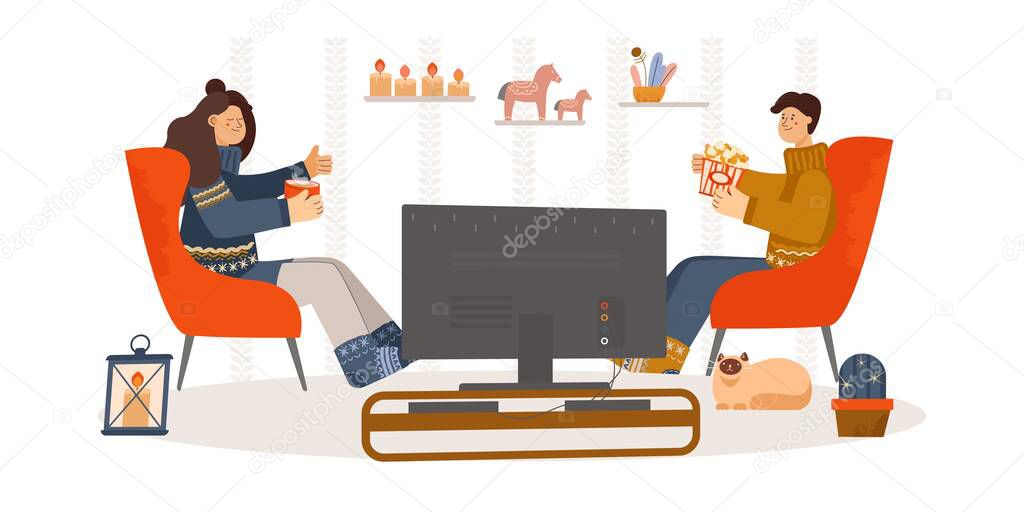 watch TV. Viewing news or shows. woman and men in an armchair are watching a movie. cozy home. family is resting