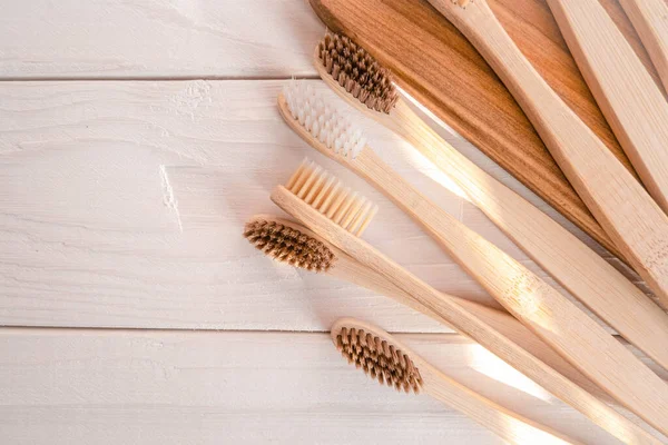 Zero waste bamboo toothbrush on eco wooden white background — Stock Photo, Image