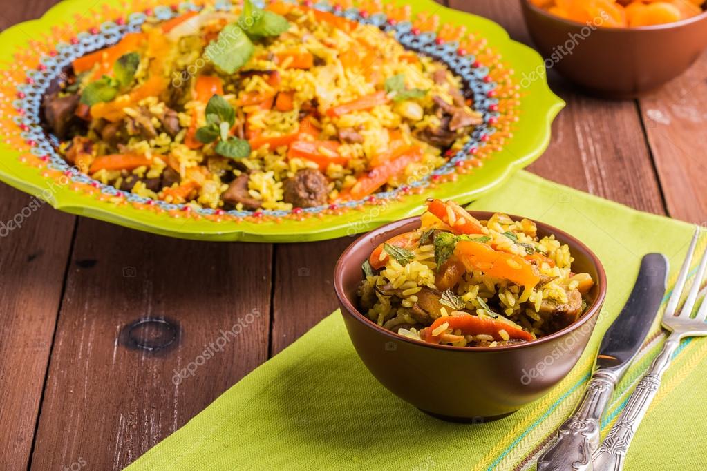 Turkish pilaf with lamb, turmeric and spices in traditional styl Stock
