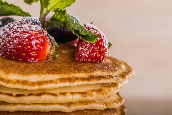 Homemade pancakes with berries and fruit