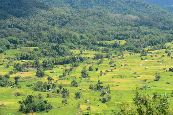 Beautiful top view of a village in the valley, Sunsuron Tambunan, Sabah, Malaysia. Travel And Tour To Sabah, The Land Below The Wind, Borneo, Malaysia