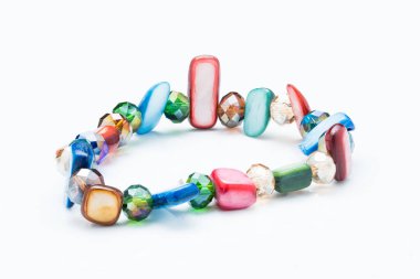 Colorful minerals and precious stones bracelet with white background