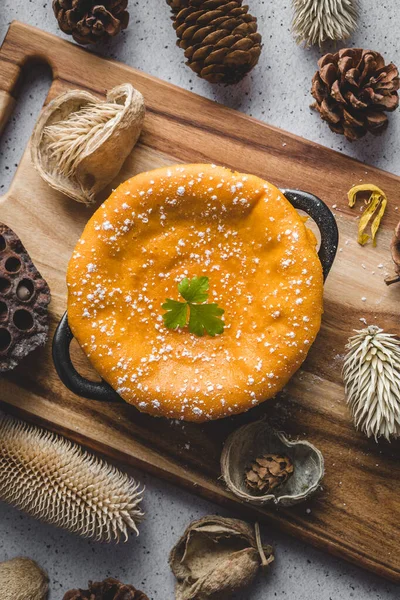 Sweet potato cake decorated with dry leaves