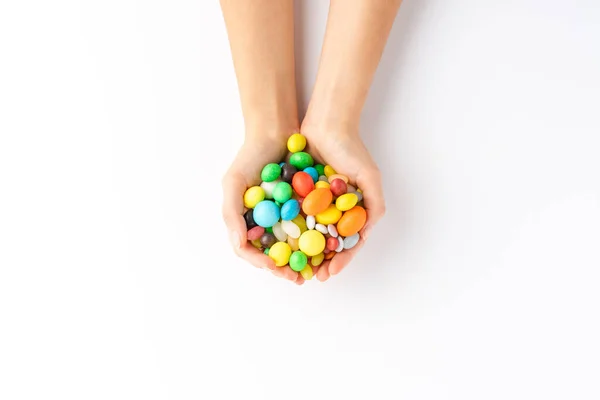 Kopfschuss Von Frauenhänden Mit Bunten Süßigkeiten Und Bonbons Auf Weißem — Stockfoto