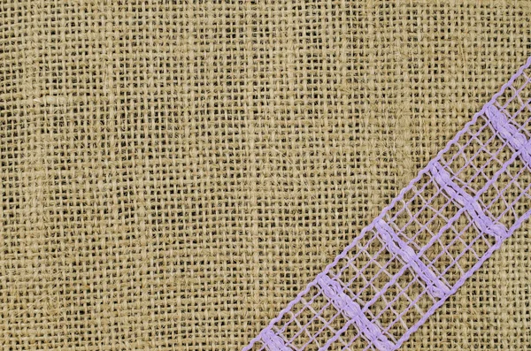 Ramka fioletowy wstążki na tle płótno — Zdjęcie stockowe