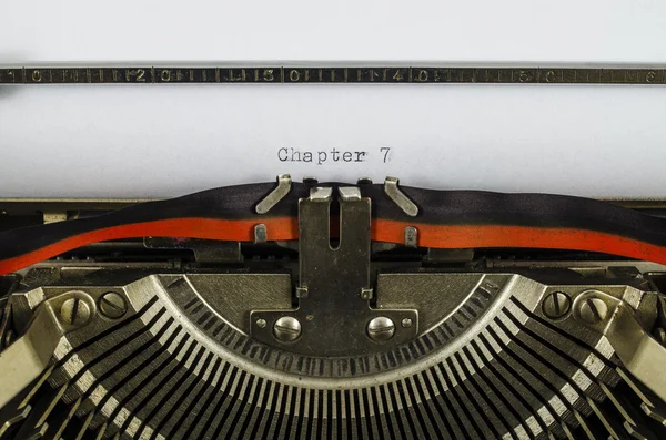 Chapter 7 word printed on an old typewriter — Stock Photo, Image