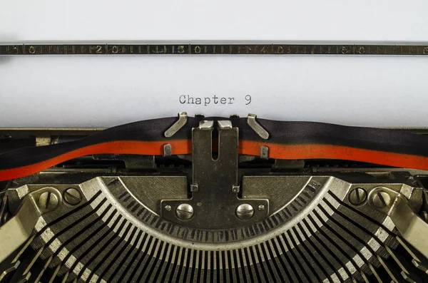 Chapter 9 word printed on an old typewriter — Stock Photo, Image