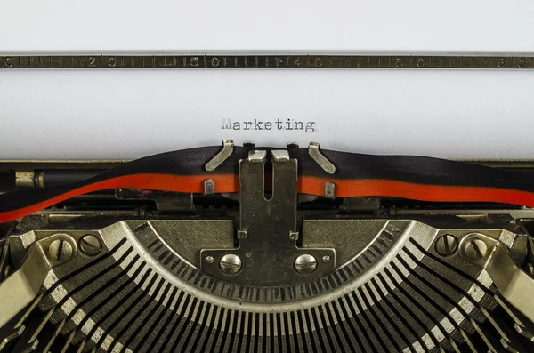 Marketing word printed on an old typewriter — Stock Photo, Image