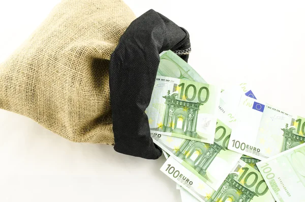 Jute bag full of money on white background — Stock Photo, Image
