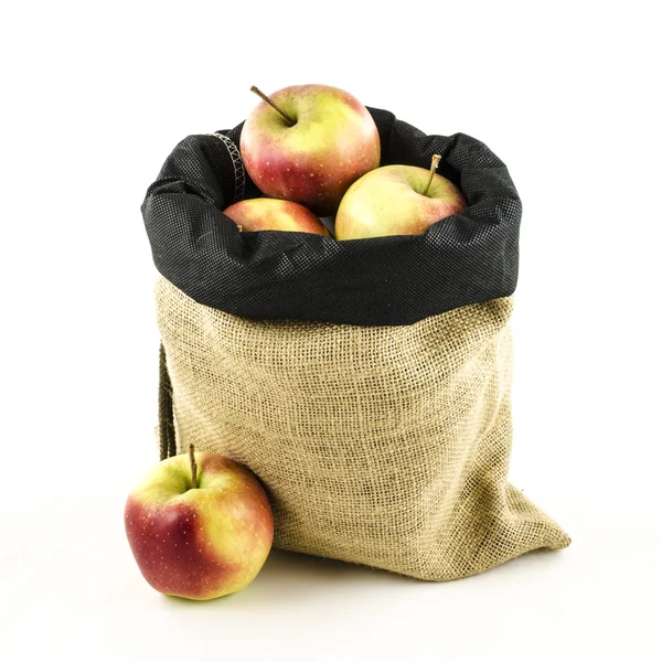 Kasse av jute med frukter — Stockfoto