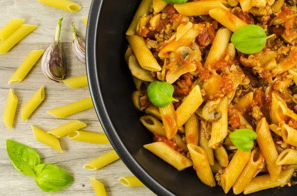 Pasta with mushrooms, minced meat and tomatoes — Stock Photo, Image