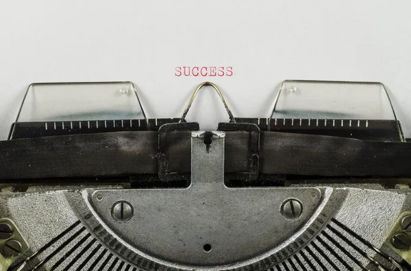 Mot à succès imprimé sur une vieille machine à écrire — Photo