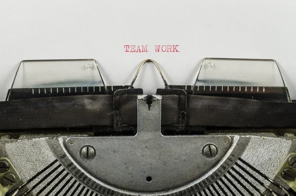 Team work word printed on an old typewriter — Stock Photo, Image