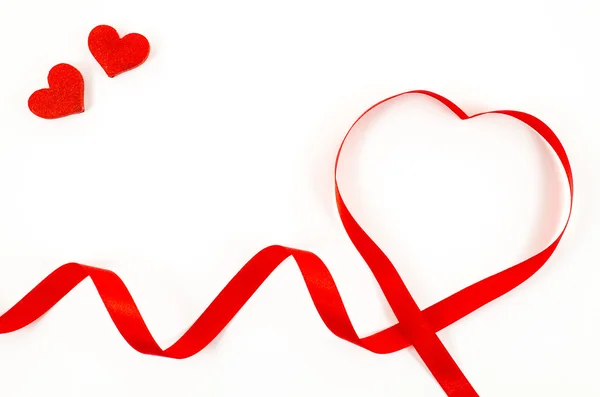 Heart shaped ribbon on white background — Stock Photo, Image