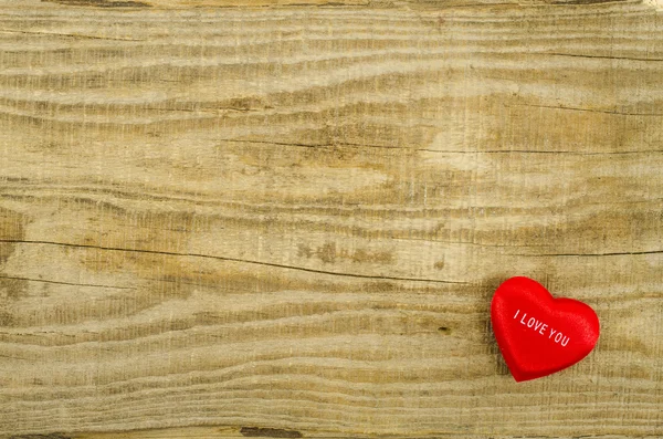 Hearts on empty wooden table — Stock Photo, Image