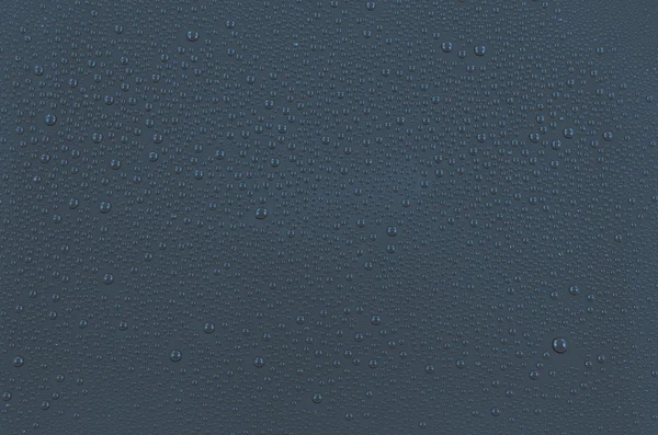 Arka plan koyu mavi su damlaları — Stok fotoğraf