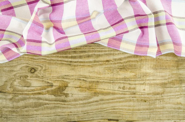 Składany ręcznik na drewnianym stole — Zdjęcie stockowe